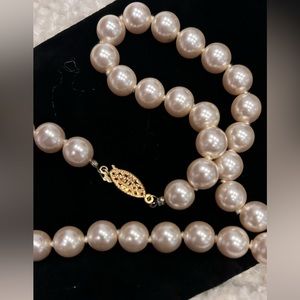 Vintage pearl strand with gold clasp
